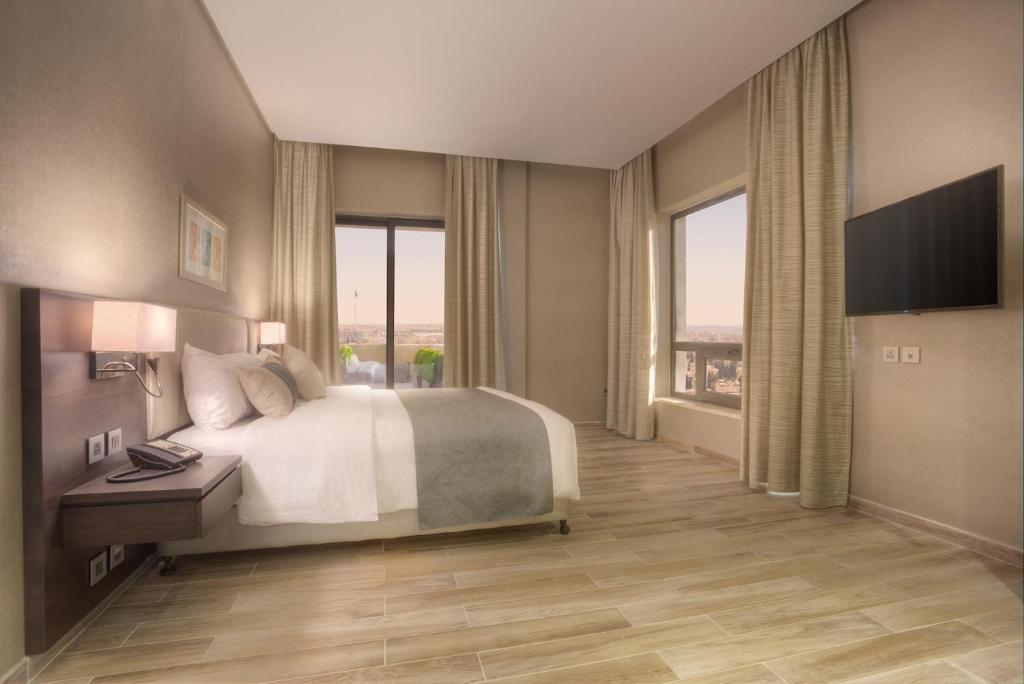 The House Boutique Suites Amã Exterior foto A bedroom at the hotel