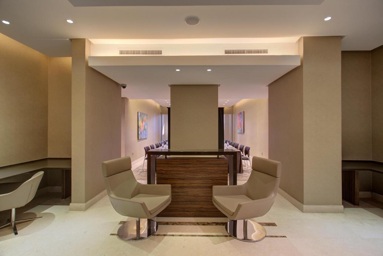 The House Boutique Suites Amã Exterior foto The interior of the lounge